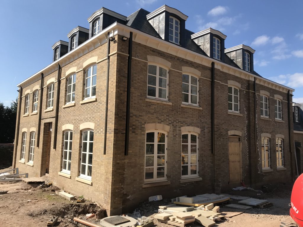bronze guttering and down pipes in alderly edge front