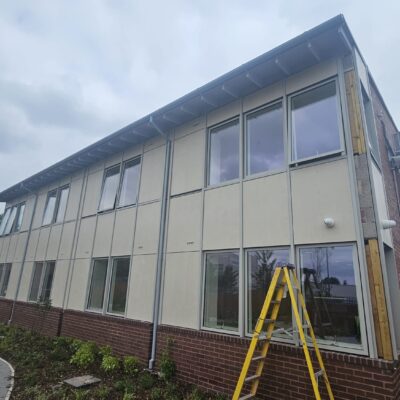 half round gutters and downpipes on a commercial building