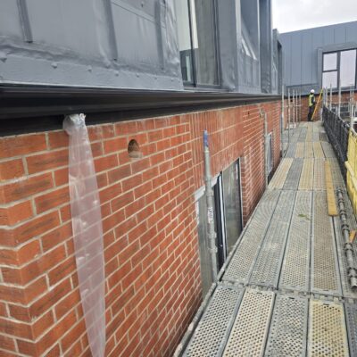 seamless gutters with temporary downpipes